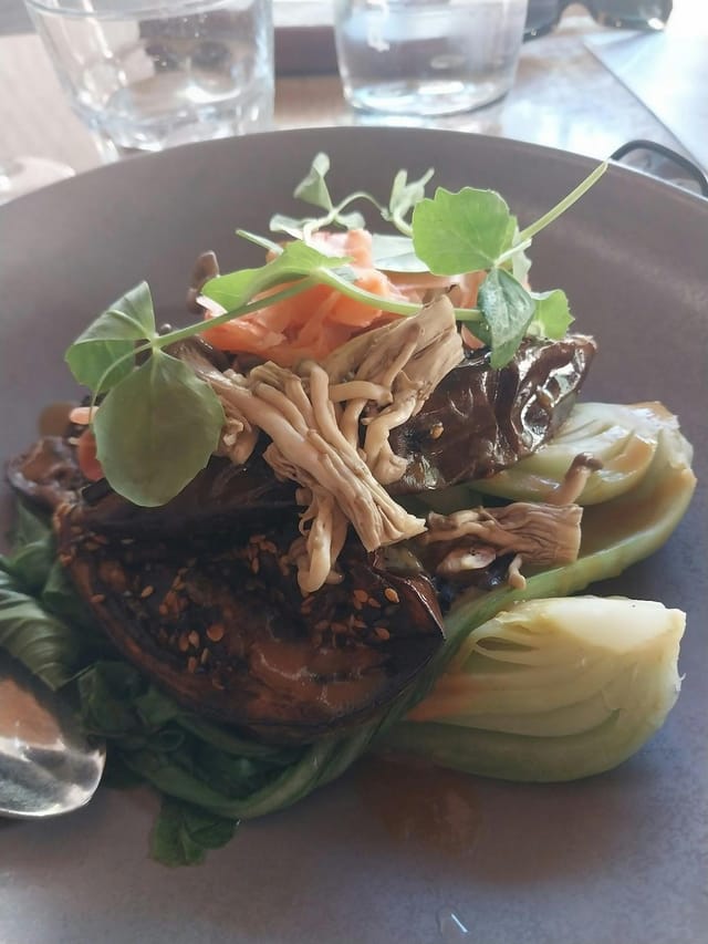 Beautifully presented vegetable dish at La Maison Restaurant, perfect for events and catering.