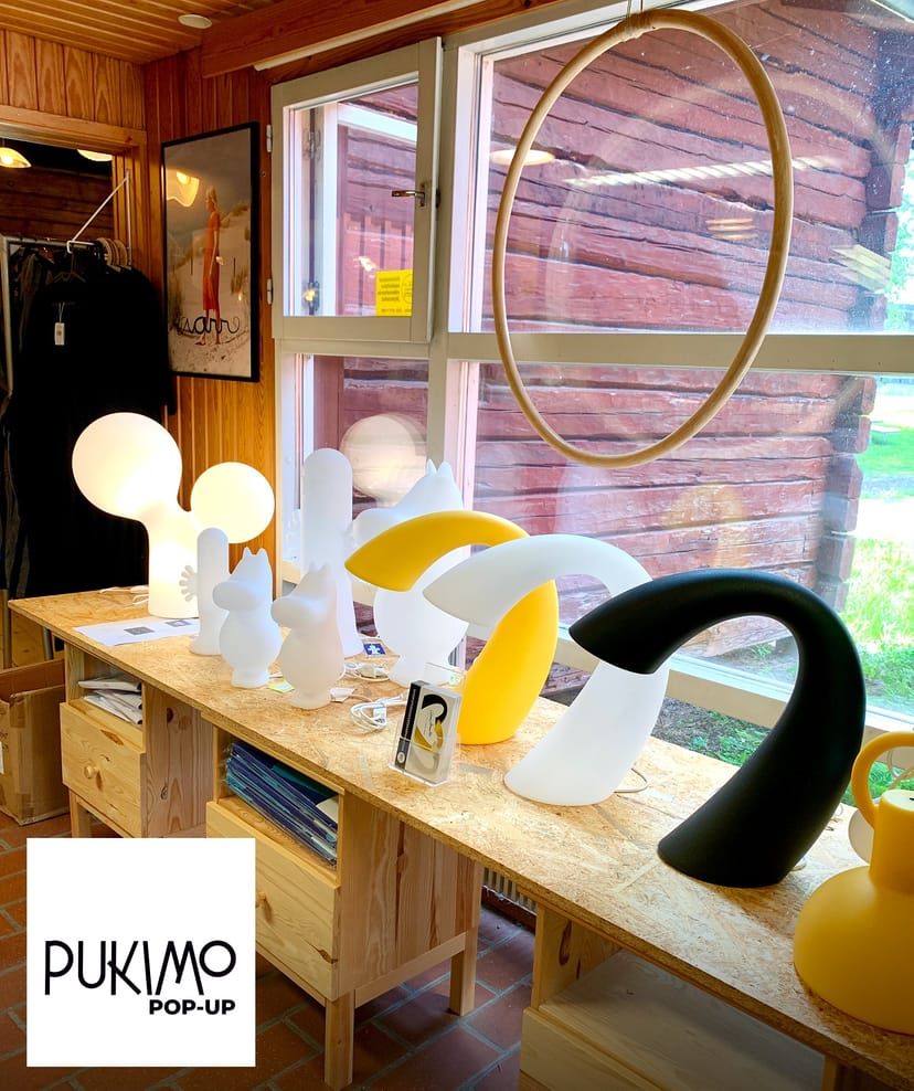Stylish lamps in Iittala Village outlet mall for events and gatherings.