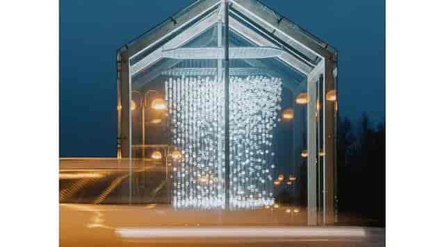 Illuminated modern outlet mall in Iittala Village, ideal for events and gatherings.