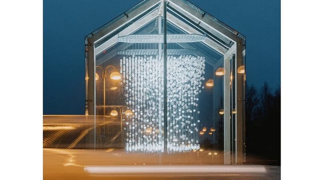 Illuminated modern outlet mall in Iittala Village, ideal for events and gatherings.