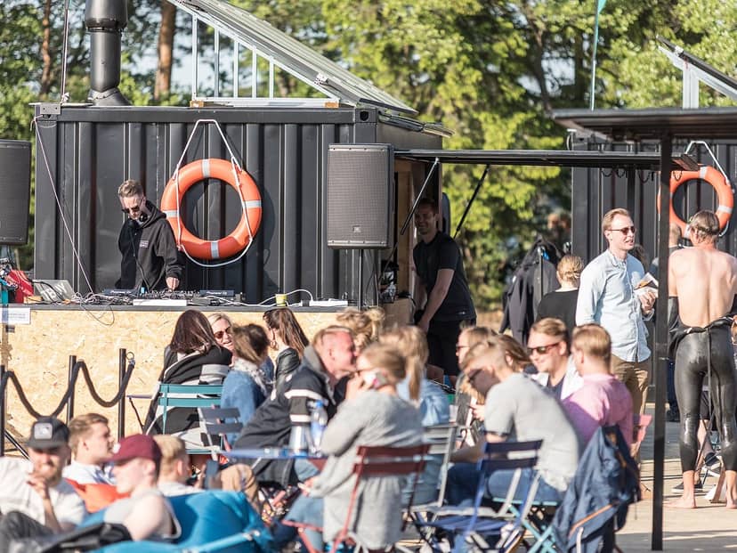 Laguuni outdoor restaurant event with lively crowd, ideal for summer networking and celebration