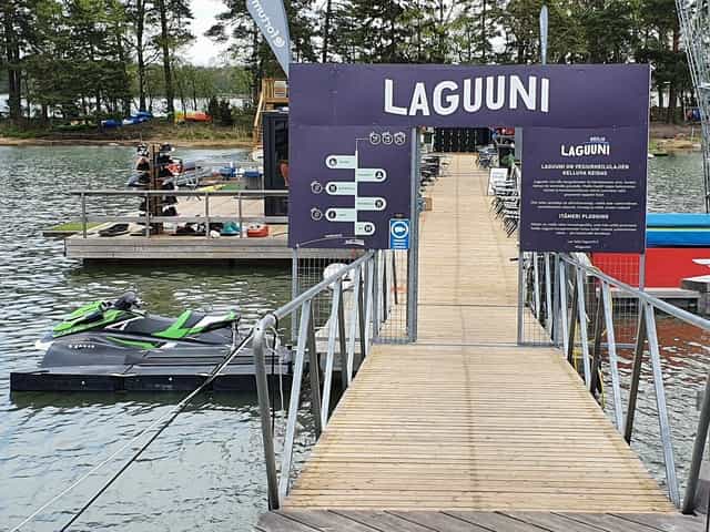 Scenic Laguuni Keilis dock with jet skis for corporate events and team-building activities.
