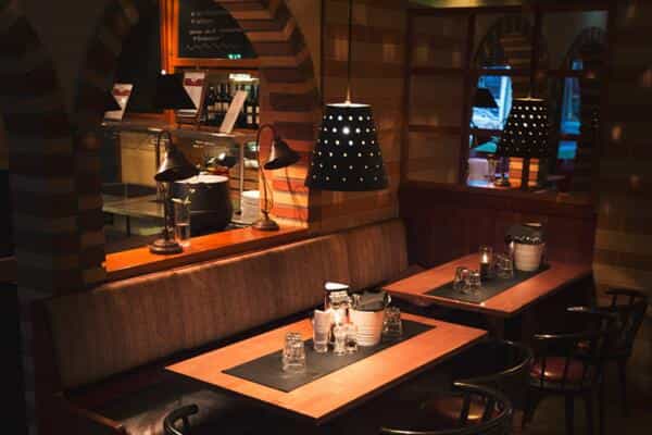 Cozy restaurant setting at Ravintola Casa Mare, ideal for team retreats and gatherings.