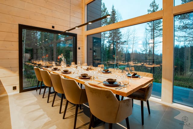 Dining area at Hilla Villas with elegant table setting, ideal for gatherings and corporate events.