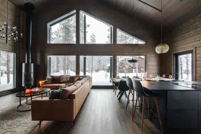 Cozy modern event space with large windows, ideal for retreats and intimate gatherings.
