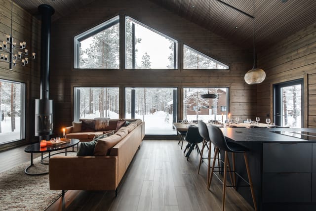 Cozy modern event space with large windows, ideal for retreats and intimate gatherings.