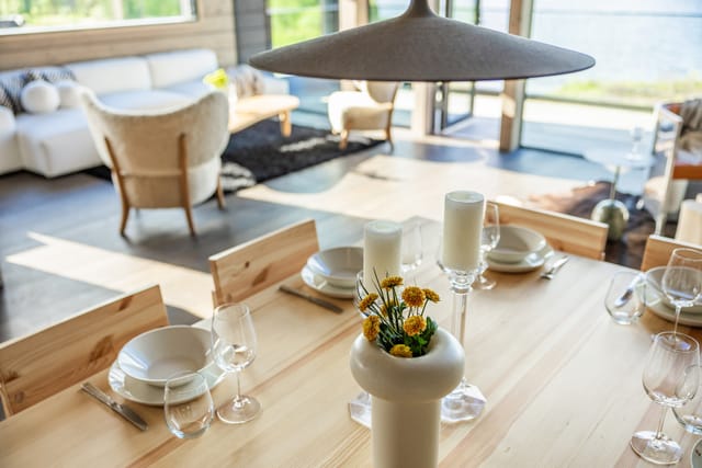 Elegant dining table at Villa Welhonranta for meetings and gatherings.