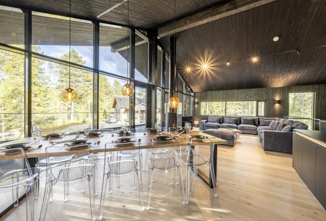 Villa Welhonranta event space with large windows, perfect for intimate gatherings and workshops.
