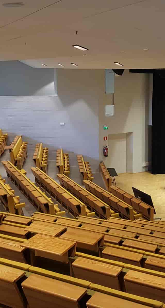 Spacious Lumituuli auditorium in Dipoli, ideal for conferences and lectures.