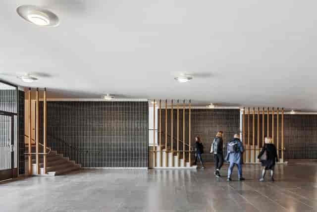 PWC Hall at Aalto University: modern venue with natural lighting for events and meetings.