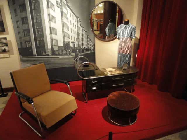 Vintage-inspired meeting space with mid-century modern chair in Helsinki City Museum.