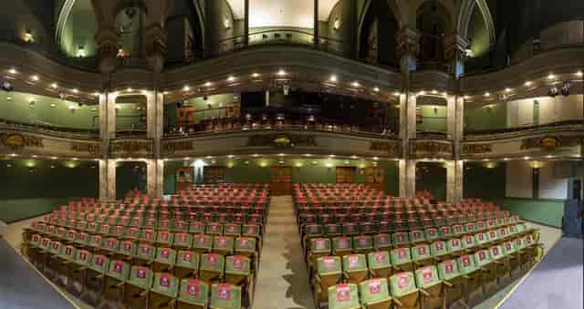 Fernando de Rojas Theatre auditorium, elegant setup for conferences and ceremonies.