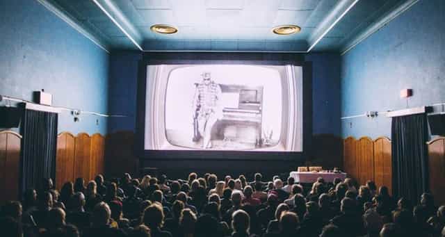 Engaged audience in vintage cinema at The Labia Theatre, perfect for events and film screenings.
