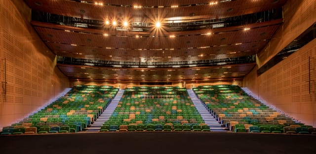 Spacious CTICC auditorium with tiered seating, ideal for conferences and events.