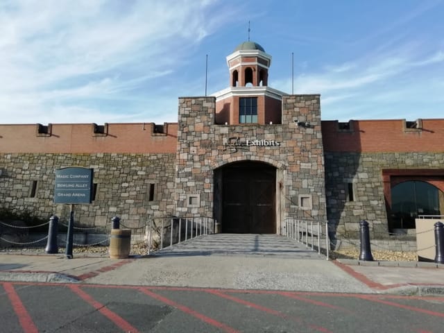 Grand Arena entrance at GrandWest, featuring modern stone architecture for events.
