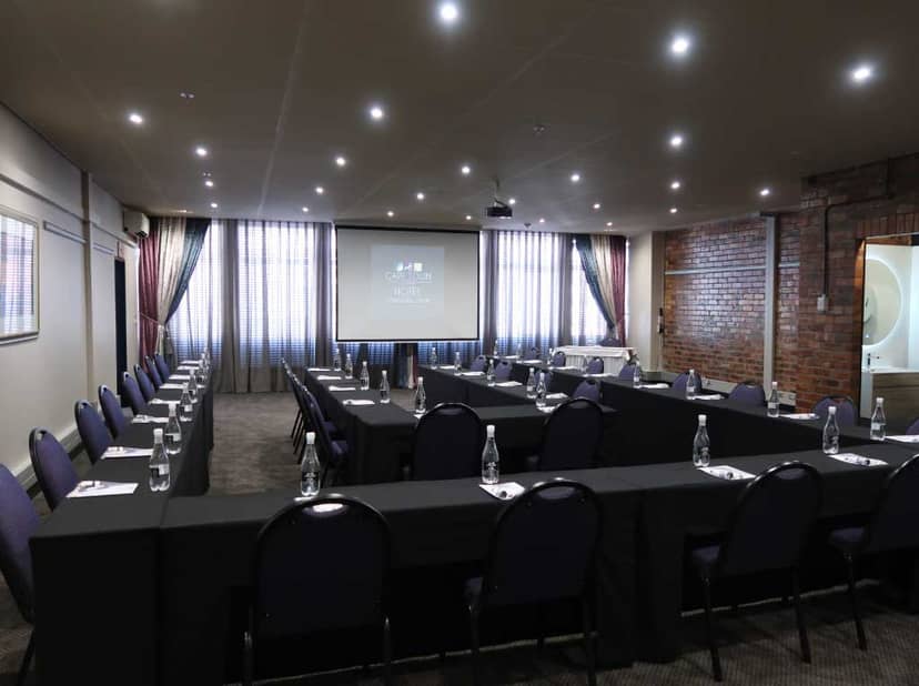 Workshop room at Cape Town Lodge, featuring classroom seating and natural light for events.
