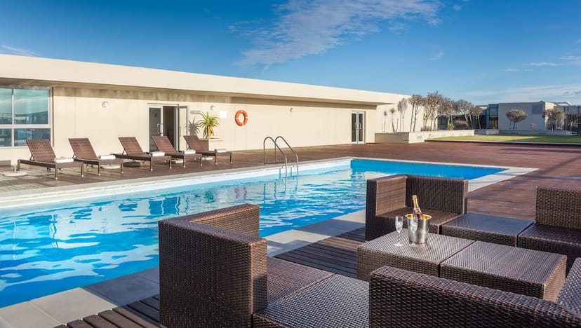Outdoor pool area at Lagoon Beach Hotel for upscale corporate events and gatherings.