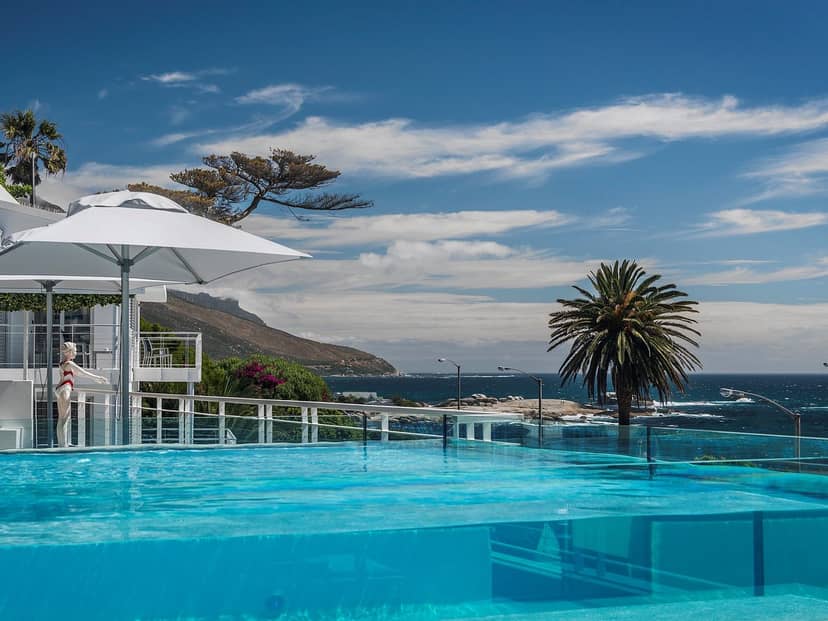 Sandy B Private Beach Club with pool, ideal for upscale outdoor events by the ocean.