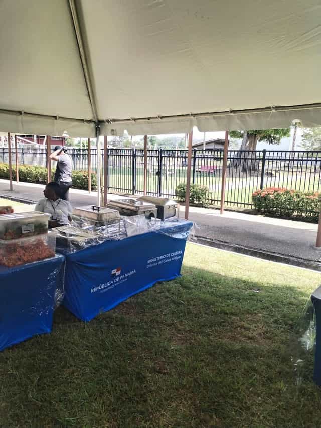 Cape Town Jazz Festival outdoor catering setup with covered trays for inviting guest dining.