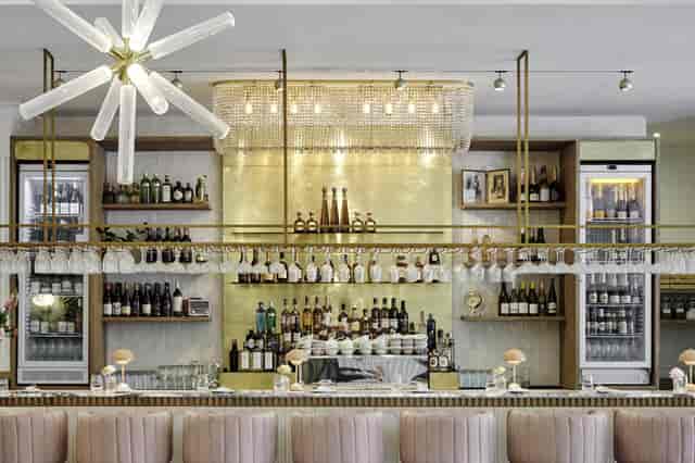 Sophisticated bar setup with elegant lighting, perfect for networking events and cocktail receptions.