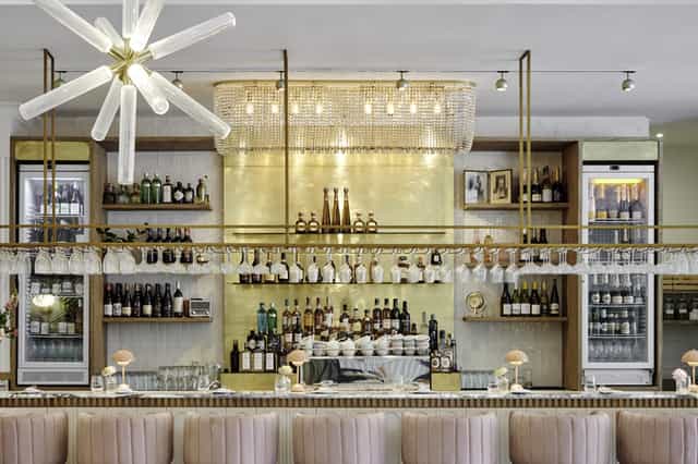 Sophisticated bar setup with elegant lighting, perfect for networking events and cocktail receptions.