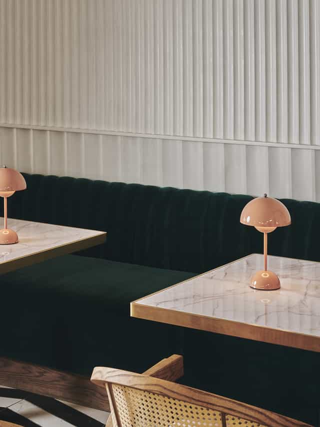 Elegant meeting space with plush seating and warm lighting for creative gatherings.
