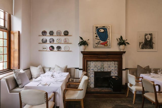 Elegant conference room at The Alphen for intimate meetings and private dinners.