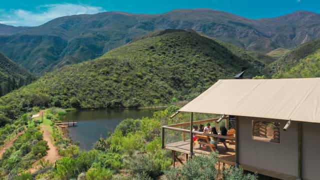 Africamps Boutique Tents with mountain view, perfect for retreats and team events.