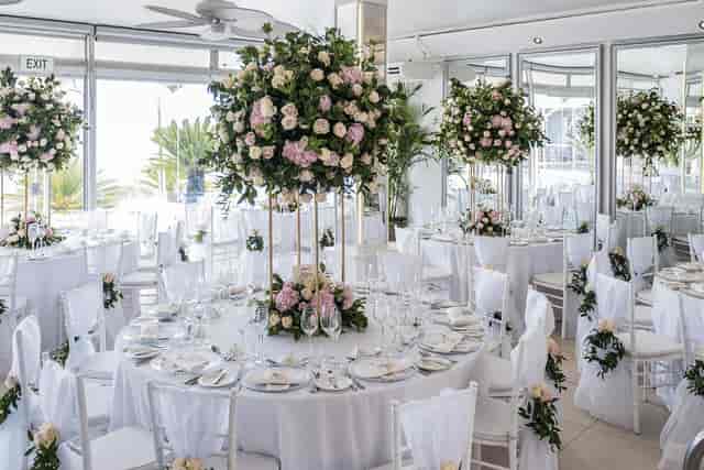 Elegant Atlantic Marquee with floral centerpieces, perfect for weddings and corporate events.