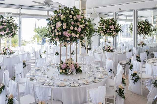 Elegant Atlantic Marquee with floral centerpieces, perfect for weddings and corporate events.