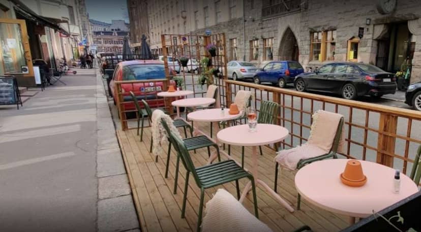 Charming outdoor seating at Grape Wine Bar, perfect for al fresco events and gatherings.