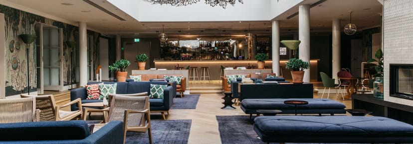 Contemporary lounge at Hotel St. George, ideal for networking events with stylish seating.