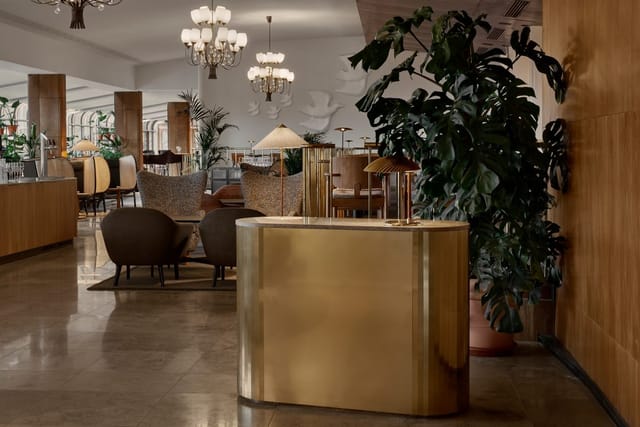 Chic restaurant lobby with elegant decor, perfect for networking events and meetings.