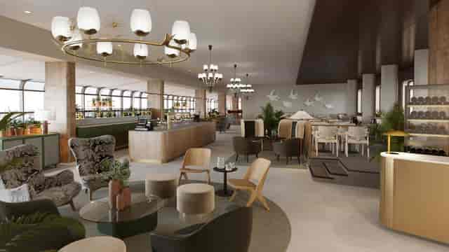 Olympia-kabinetti: modern event space with elegant seating for networking and gatherings.