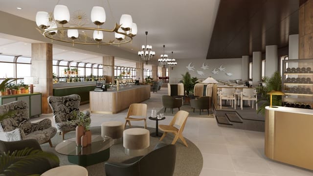 Olympia-kabinetti: modern event space with elegant seating for networking and gatherings.