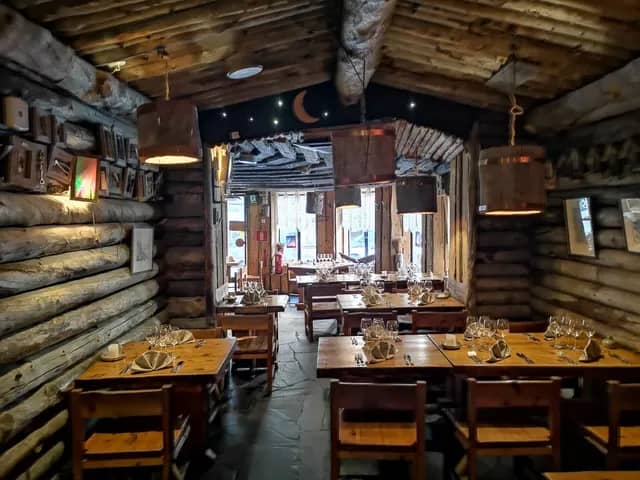 Cozy Lappi Restaurant with wooden beams, ideal for intimate events and corporate gatherings.