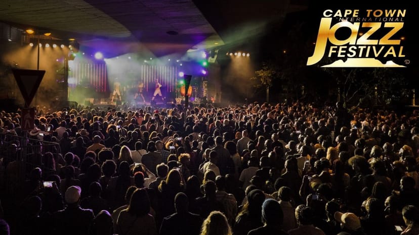 Cape Town International Jazz Festival crowd enjoying energetic performances at lively event.