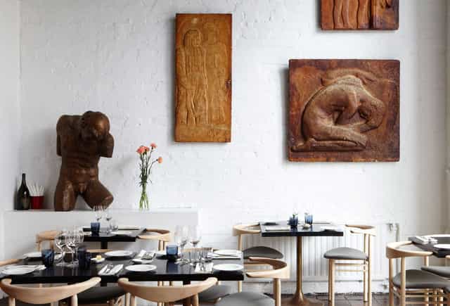 Stylish dining space in Ravintola Ateljé Finne, ideal for corporate events and intimate gatherings.