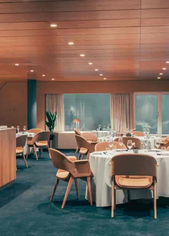 Sleek dining space at Noschis, Palace Restaurant for corporate events and gatherings.