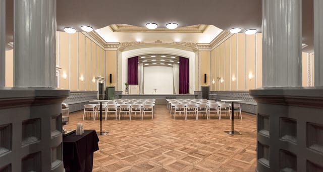 Astoria Hall event space with elegant architecture, ideal for meetings and presentations.