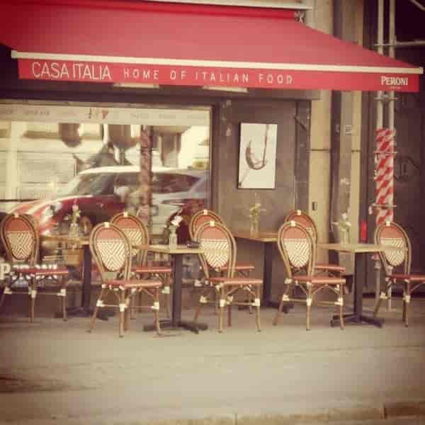 Outdoor seating at Casa Italia Deli, perfect for networking and casual meetings.