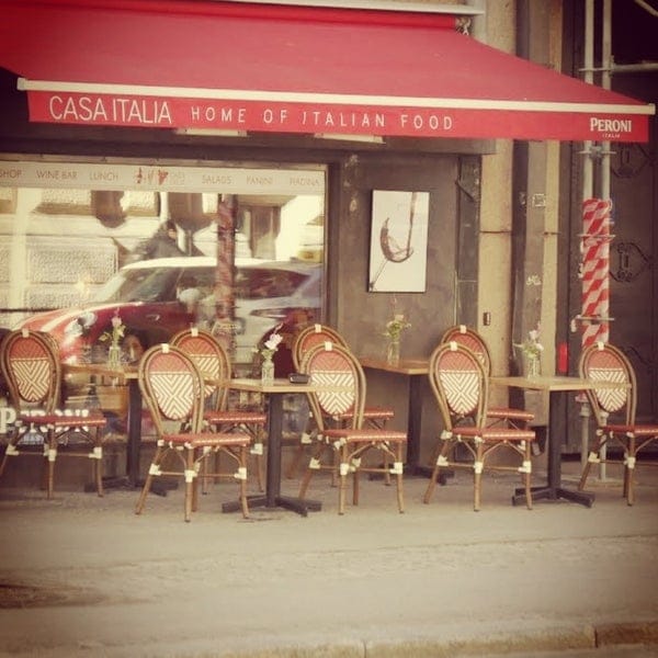 Outdoor seating at Casa Italia Deli, perfect for networking and casual meetings.
