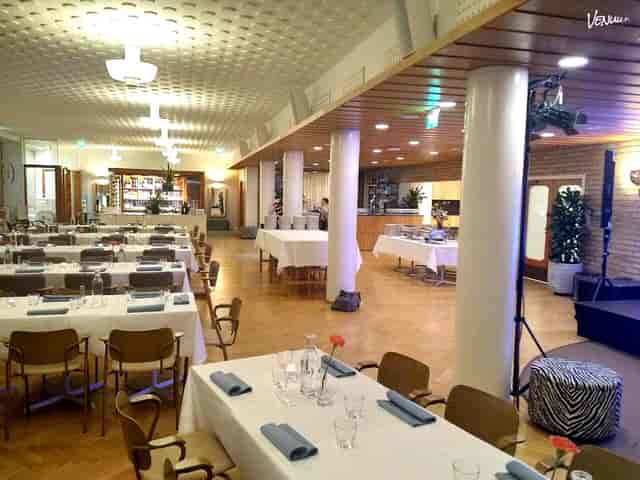 Banquet Hall in Ravintola Töölö, elegant setting for corporate events and formal dinners.