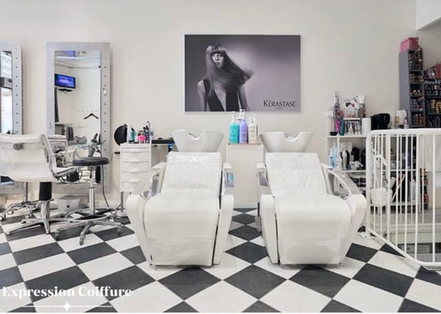 Chic hair salon with modern wash stations for exclusive beauty events and workshops.