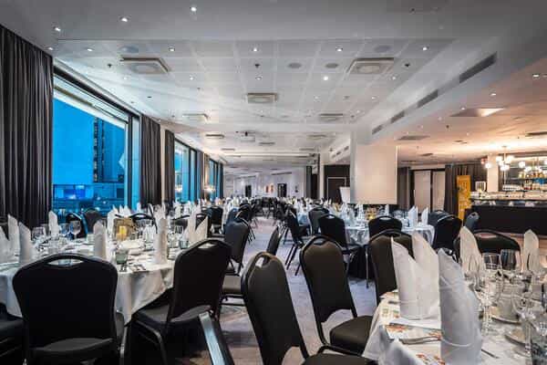 Elegant dining space at LUMO, Crowne Plaza Helsinki for corporate events and formal dinners.