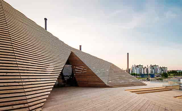 Private sauna in Löyly with dynamic wooden design for creative events and gatherings.