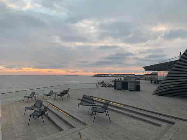 Waterfront venue in Löyly with contemporary seating for outdoor meetings and events.