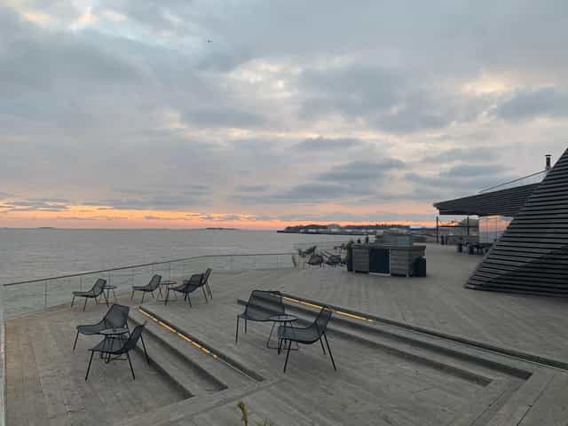 Waterfront venue in Löyly with contemporary seating for outdoor meetings and events.