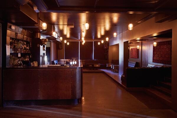 Sleek modern event space bar in Kaiku for corporate events and social functions.