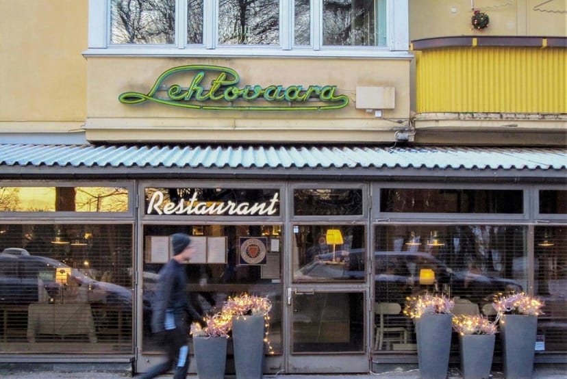 Charming Lehtovaara restaurant with cozy outdoor seating, ideal for intimate events.